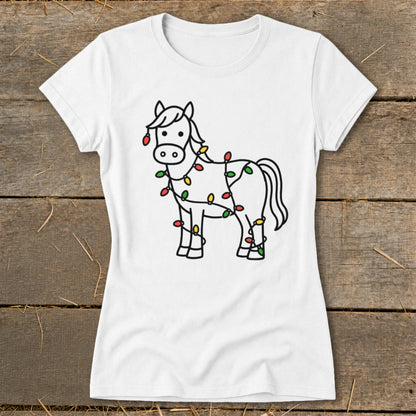 White t-shirt with a black line drawing of a horse tangled in colorful Christmas lights.