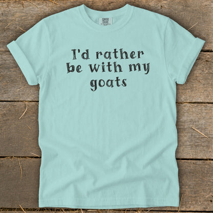 Light blue t-shirt with black text that reads "I'd rather be with my goats."