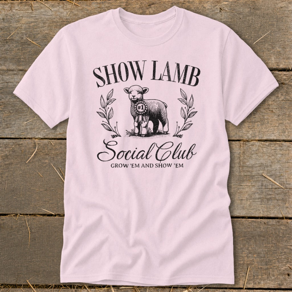 Pink t-shirt with "SHOW LAMB Social Club" text and a lamb graphic.