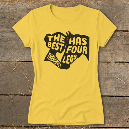 Yellow t-shirt with black graphic that reads "The Best Therapist Has Four Legs".