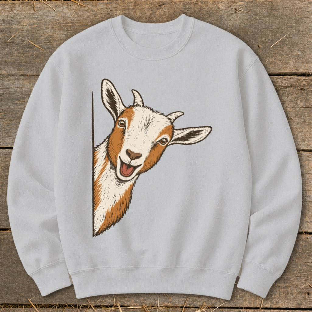 Grey sweatshirt with a peeking cartoon goat illustration.