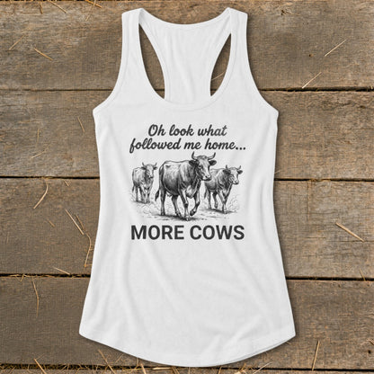 White tank top with three cows and text "Oh look what followed me home... MORE COWS".