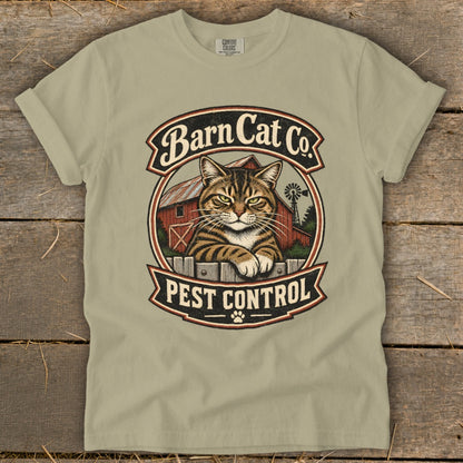 A sage green t-shirt displays a vintage-style graphic of a tabby cat and a barn.