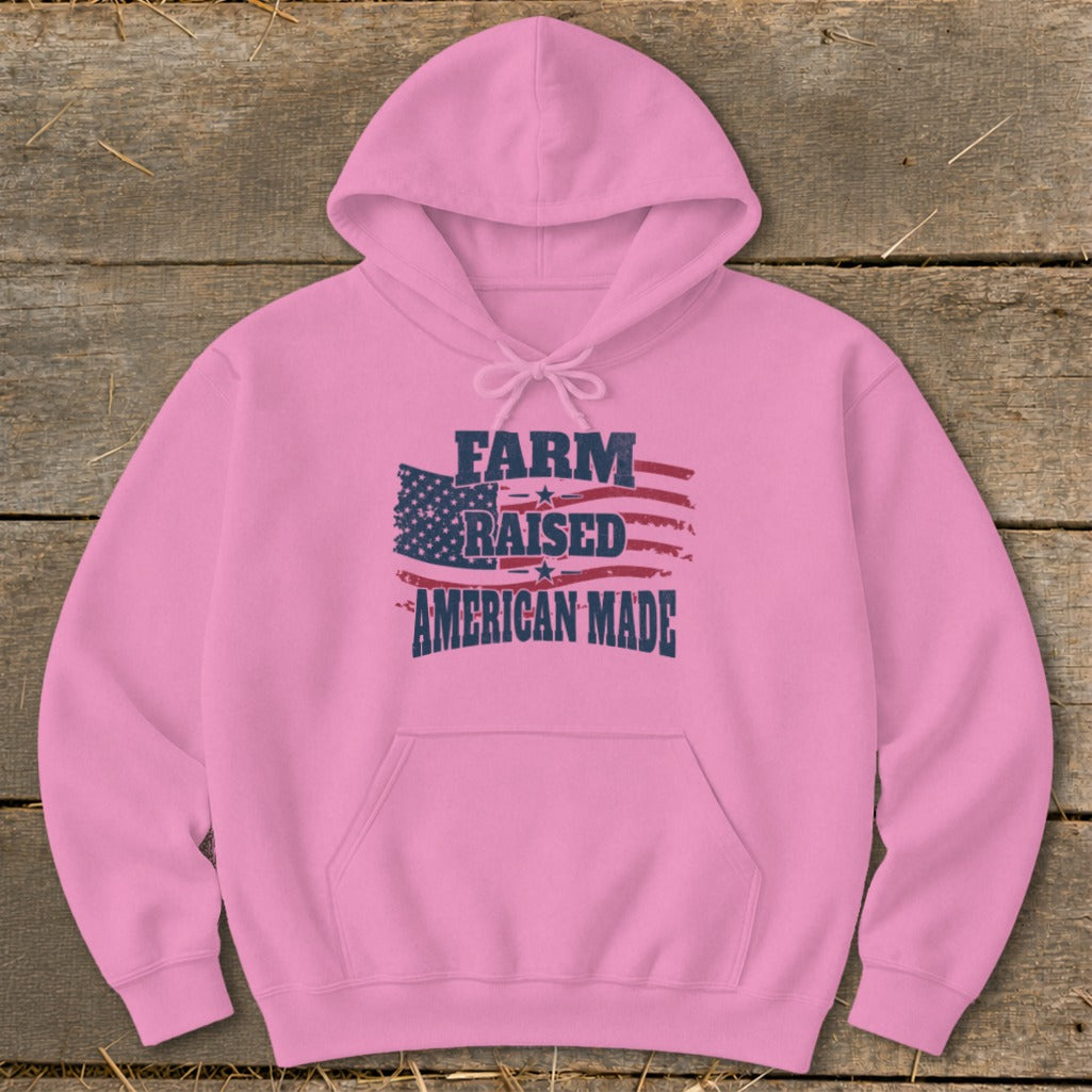 Pink hoodie with "Farm Raised American Made" and distressed American flag graphic.