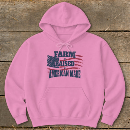 Pink hoodie with "Farm Raised American Made" and distressed American flag graphic.