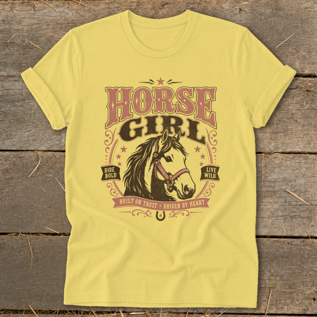 Yellow t-shirt with "Horse Girl" text and horse head graphic.