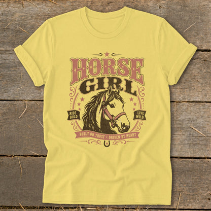 Yellow t-shirt with "Horse Girl" text and horse head graphic.