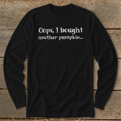 Black long-sleeve shirt with white text: "Oops, I bought another pumpkin..."