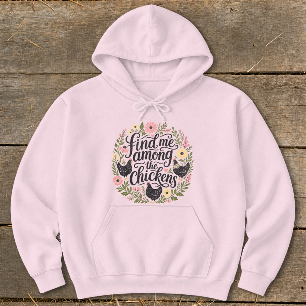 Pink hoodie with "Find me among the chickens" and floral chicken graphic.