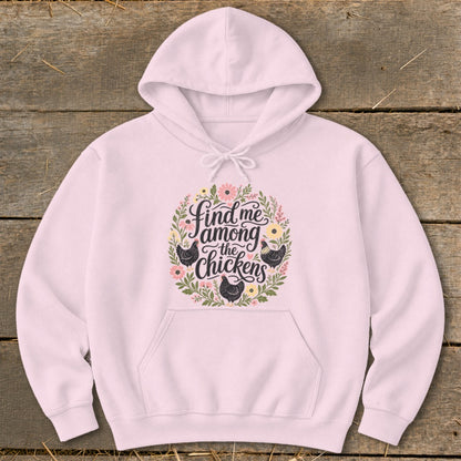 Pink hoodie with "Find me among the chickens" and floral chicken graphic.