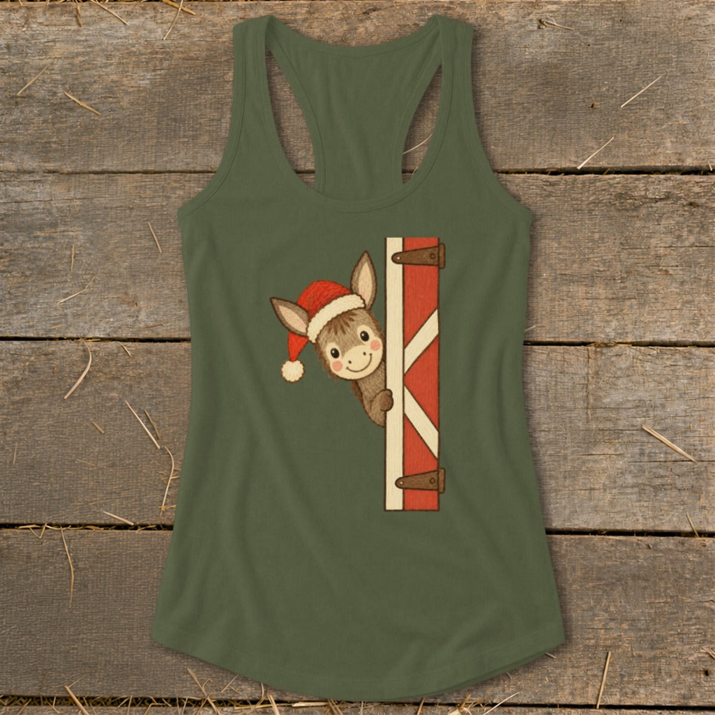 Donkey in Santa hat peeking from behind a barn door graphic on olive green tank top.