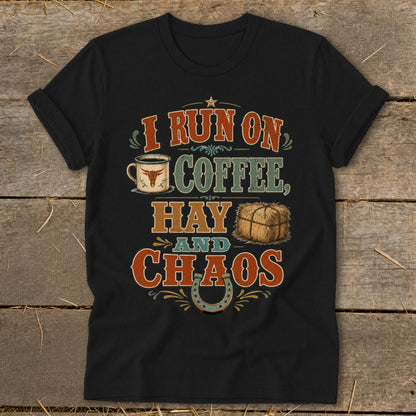 Black t-shirt with text "I RUN ON COFFEE, HAY AND CHAOS" and illustrations.