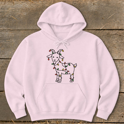 Pink hoodie with a line drawing of a goat wrapped in colorful Christmas lights.