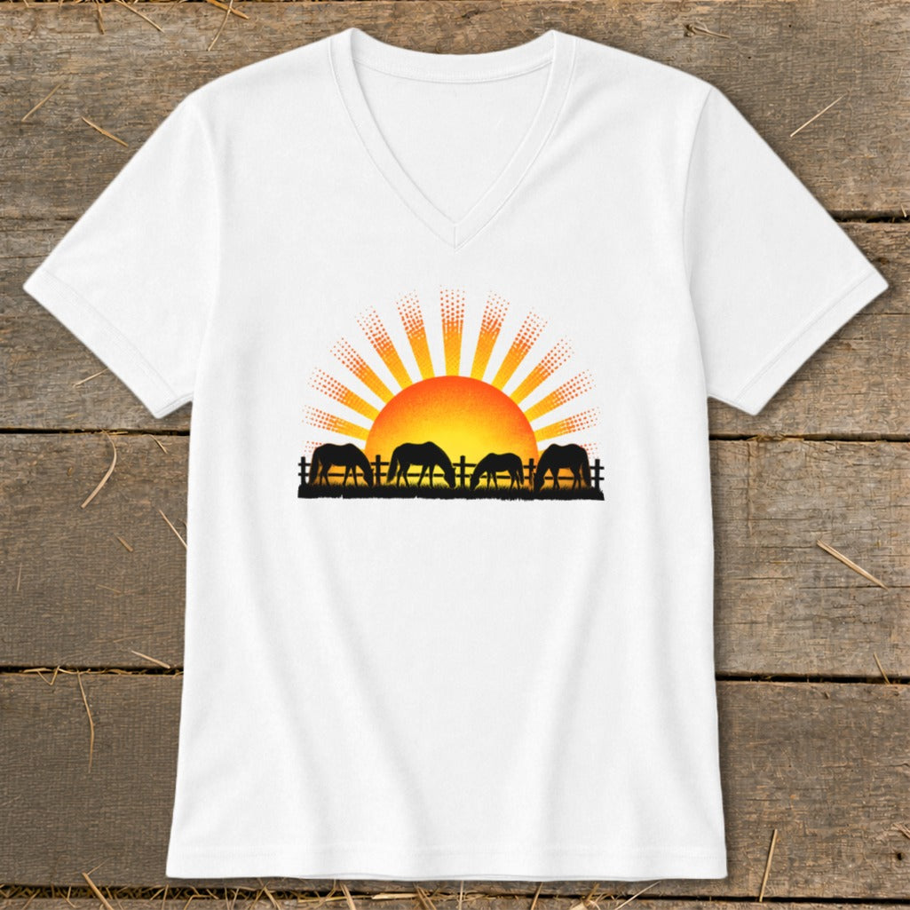 White t-shirt with horses grazing at sunset graphic.