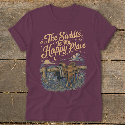Maroon t-shirt with Western saddle graphic and text "The Saddle Is My Happy Place".
