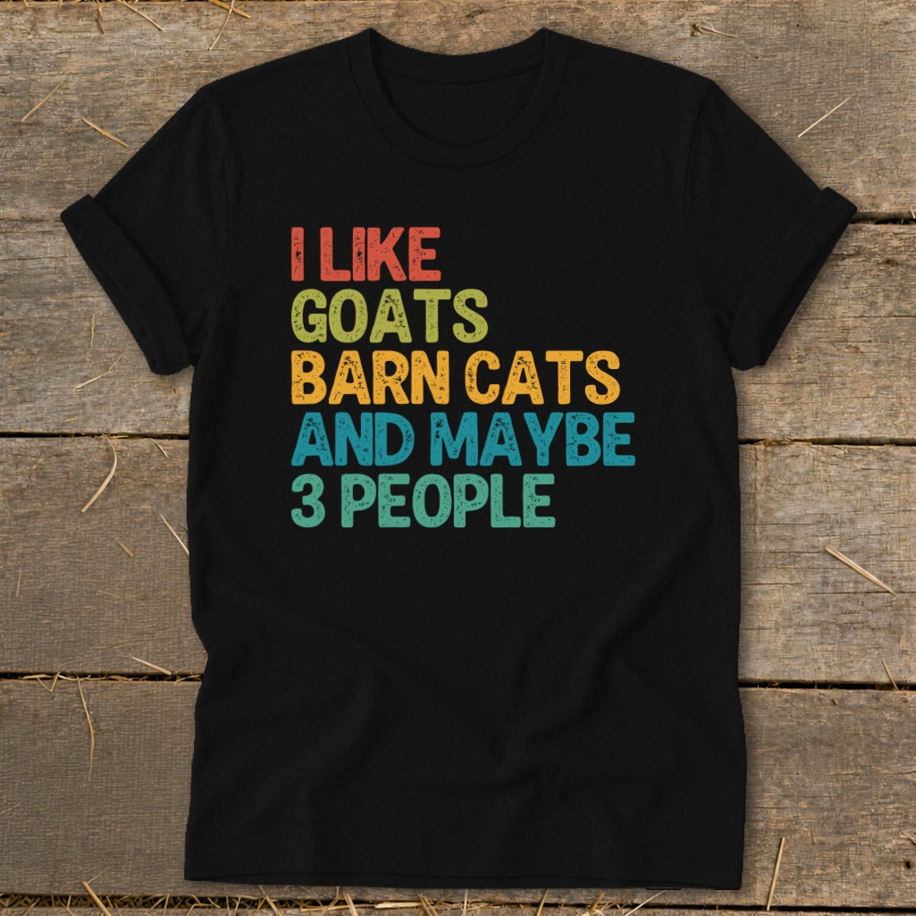 Black t-shirt with "I like goats barn cats and maybe 3 people" text.