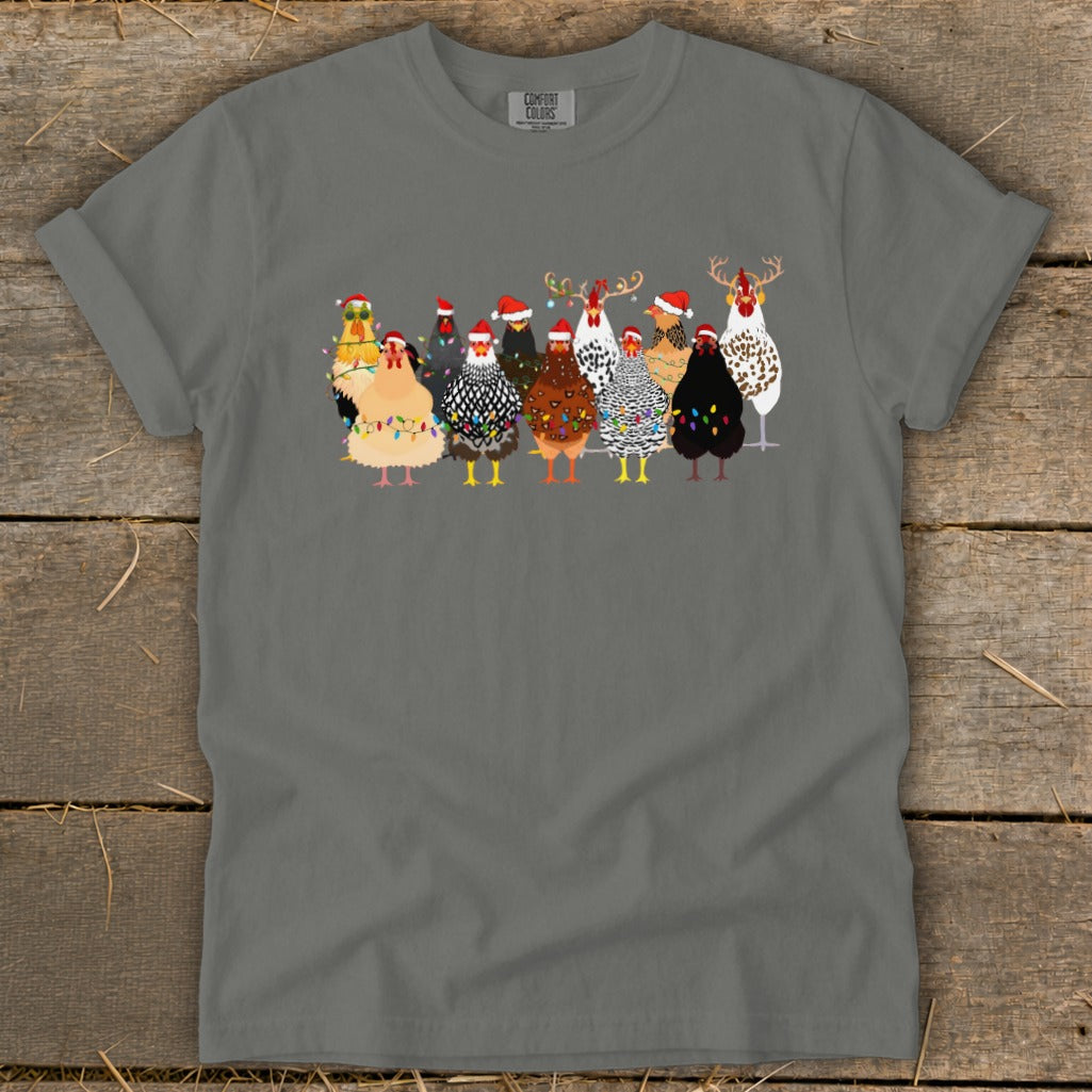 Group of festive chickens wearing Santa hats and Christmas lights, some with antlers.