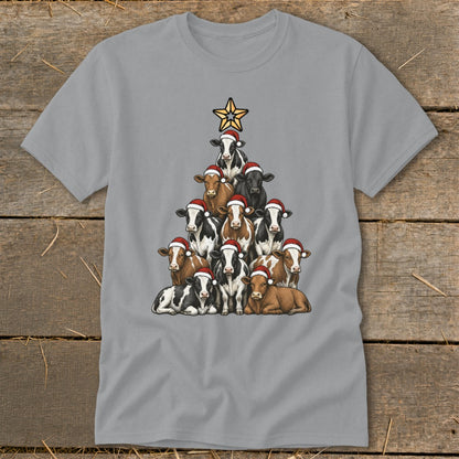 Christmas tree made of cows wearing Santa hats with a star on top.