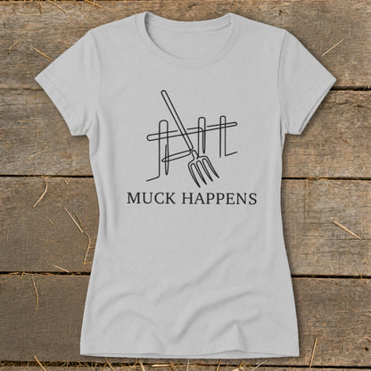 Light gray t-shirt with a black line drawing of a pitchfork and fence, and text that reads "MUCK HAPPENS".