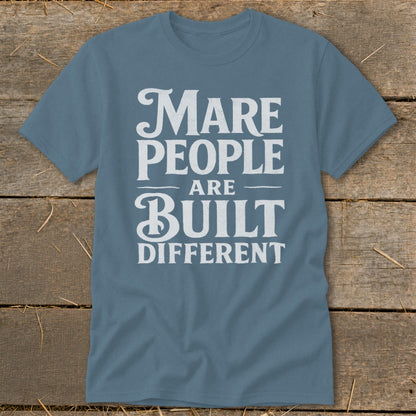 Blue t-shirt with white text: "Mare people are built different."