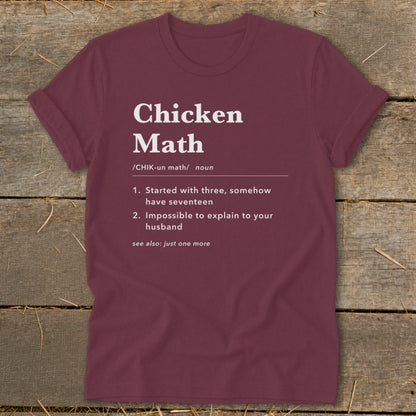 Burgundy t-shirt with "Chicken Math" definition and humorous phrases about chickens.