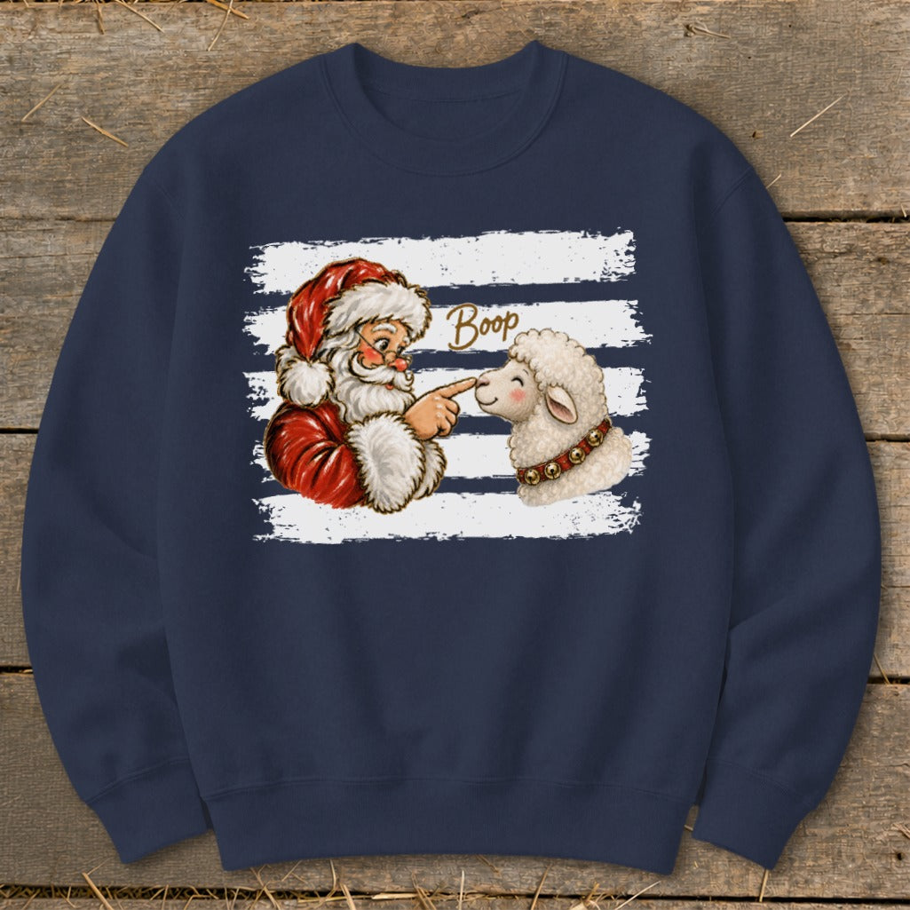 Santa booping a sheep with "Boop" text on a navy sweatshirt.