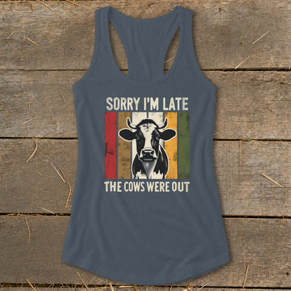 Tank top with a cow graphic and text "Sorry I'm Late The Cows Were Out".
