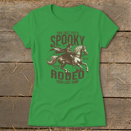Green t-shirt with western style rodeo graphic and text: Spooky, Oct 31, Your Last Haw!