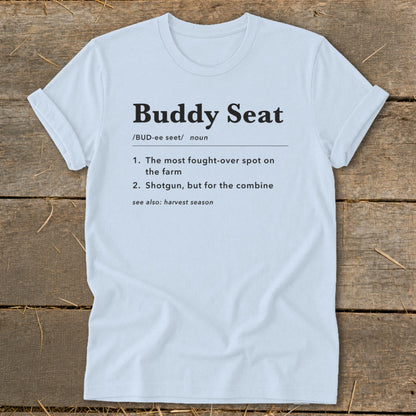 White t-shirt with "Buddy Seat" definition: fought-over farm spot, combine shotgun.