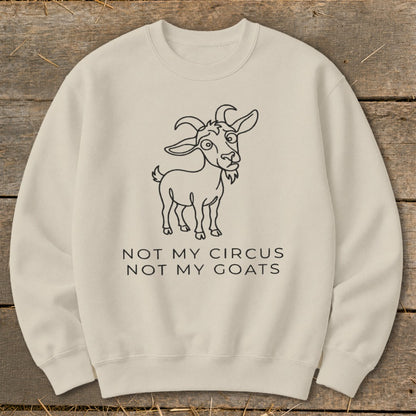 Cream crewneck sweatshirt with cartoon goat and text "NOT MY CIRCUS NOT MY GOATS".
