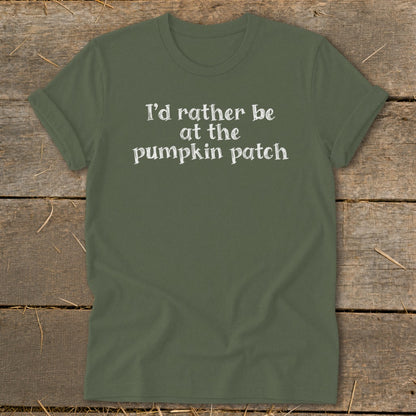 Green t-shirt with white text reading "I'd rather be at the pumpkin patch."