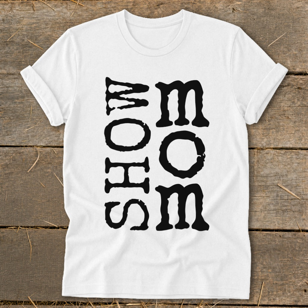 White t-shirt with black block lettering spelling "MOM" vertically on the right and "SHOW" vertically on the left.