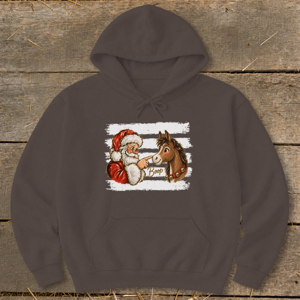 Santa booping a horse's nose with the word "Boop" on a brown hoodie.