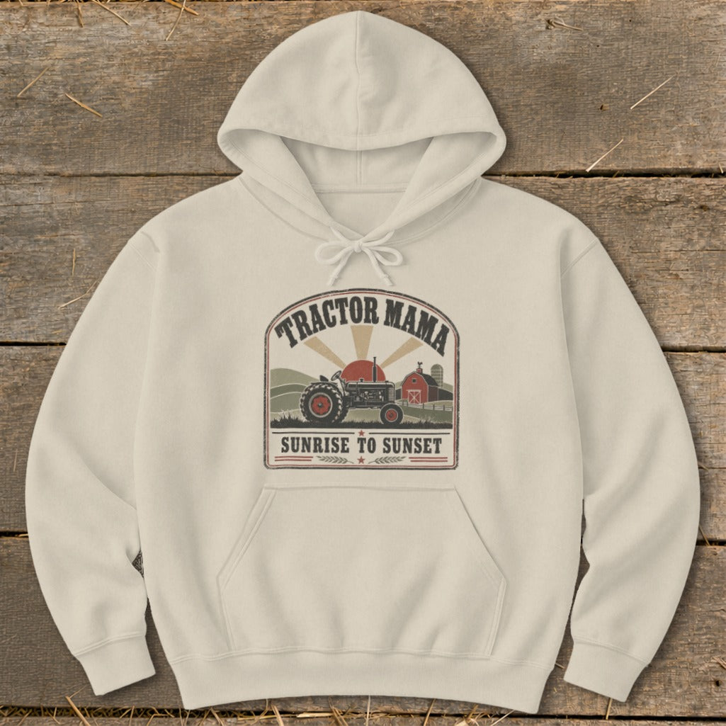 Cream hoodie with "Tractor Mama Sunrise to Sunset" graphic featuring a tractor and barn.