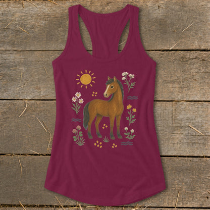 Maroon tank top featuring a brown horse illustration surrounded by flowers and a sun.