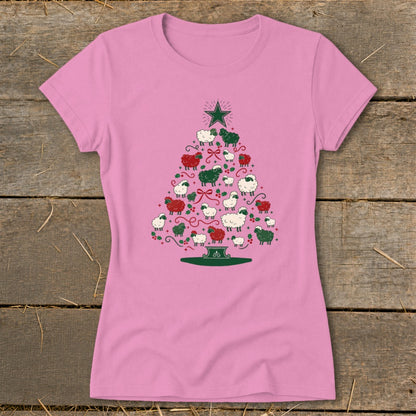 Pink t-shirt with a Christmas tree made of red, green, and white sheep.