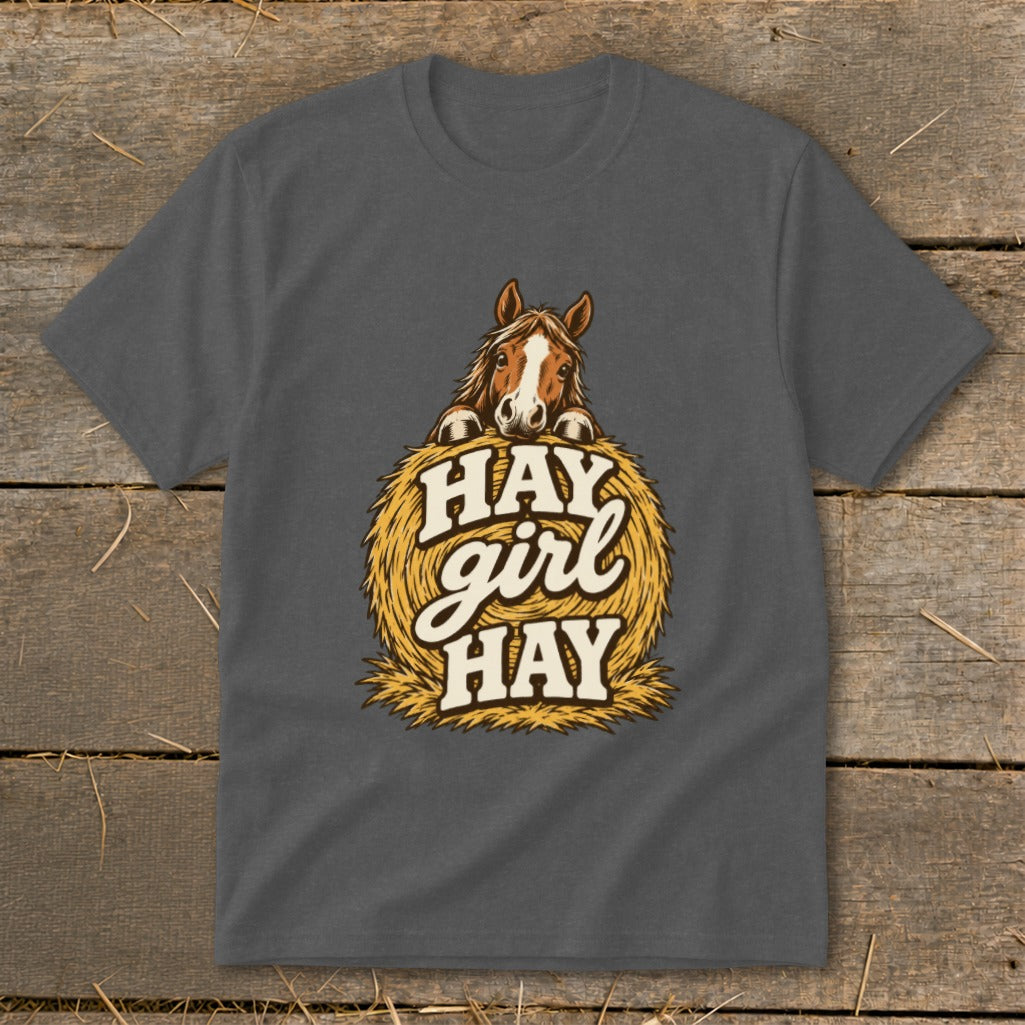 Dark grey t-shirt with horse peaking over hay bale and text "HAY girl HAY".