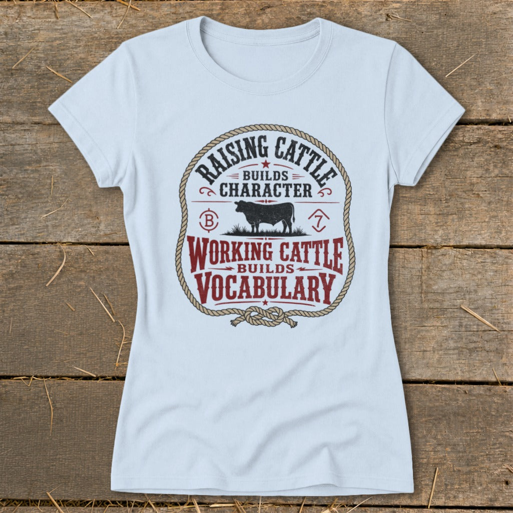 Light blue t-shirt with a circular graphic about raising and working cattle.