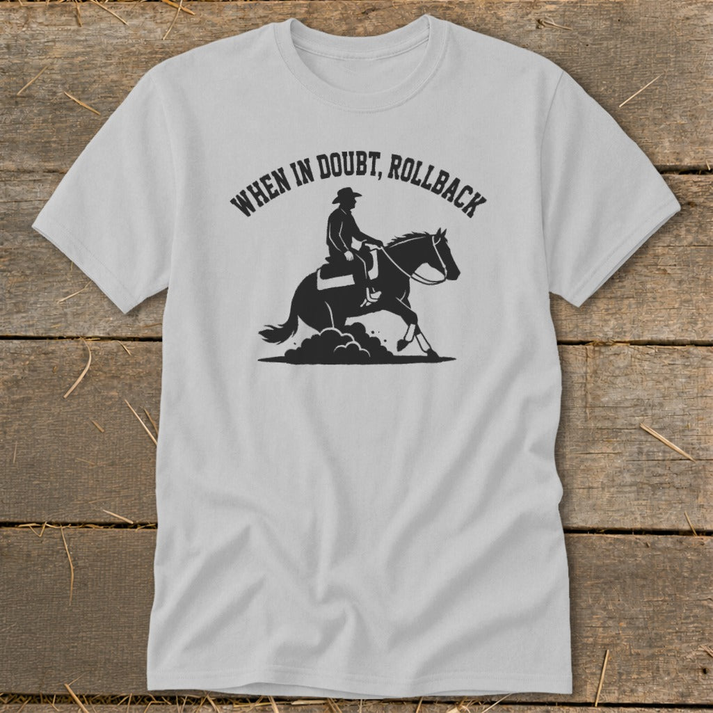 Light gray t-shirt with black graphic of a cowboy on a horse and text "When in doubt, rollback".