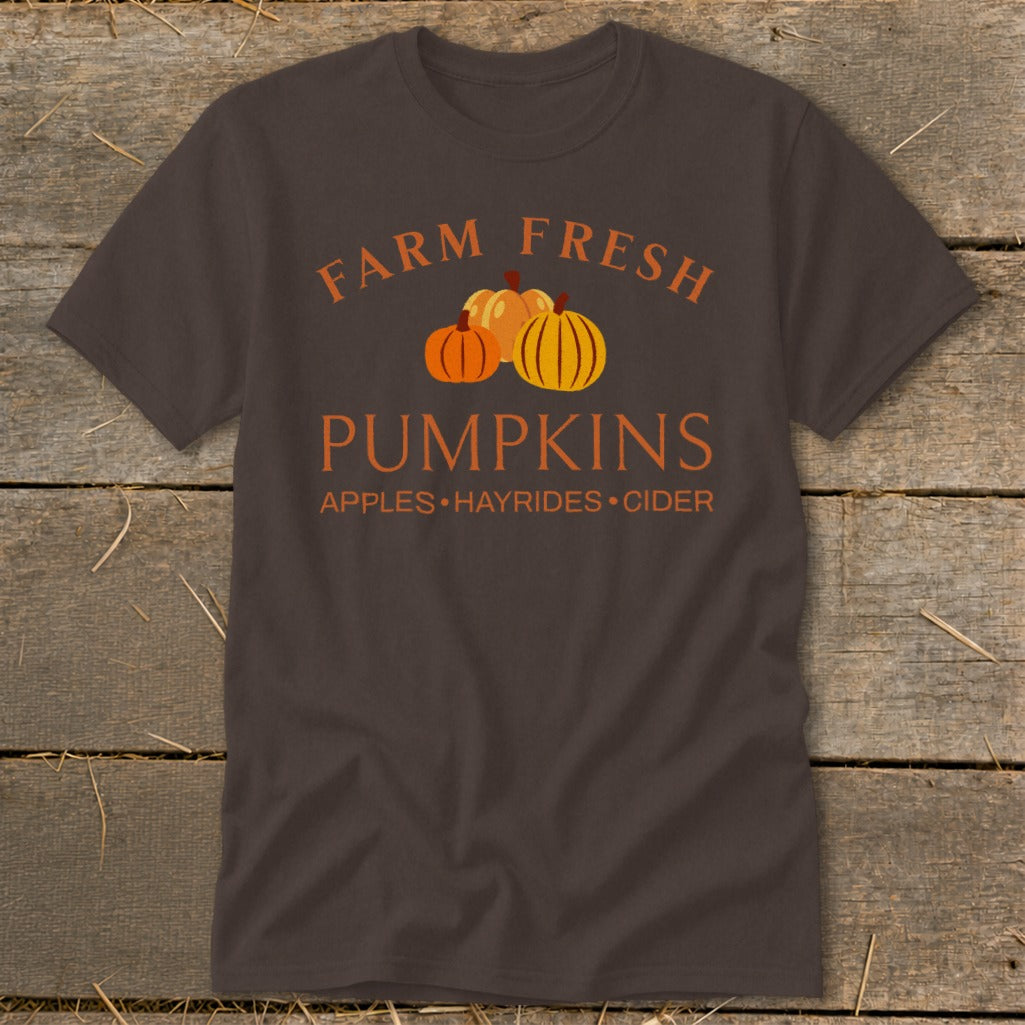 Brown t-shirt with "Farm Fresh Pumpkins" and "Apples Hayrides Cider" text.