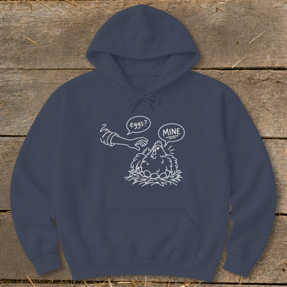 Navy hoodie with a graphic of a hand reaching for eggs and a hen saying "Mine?".