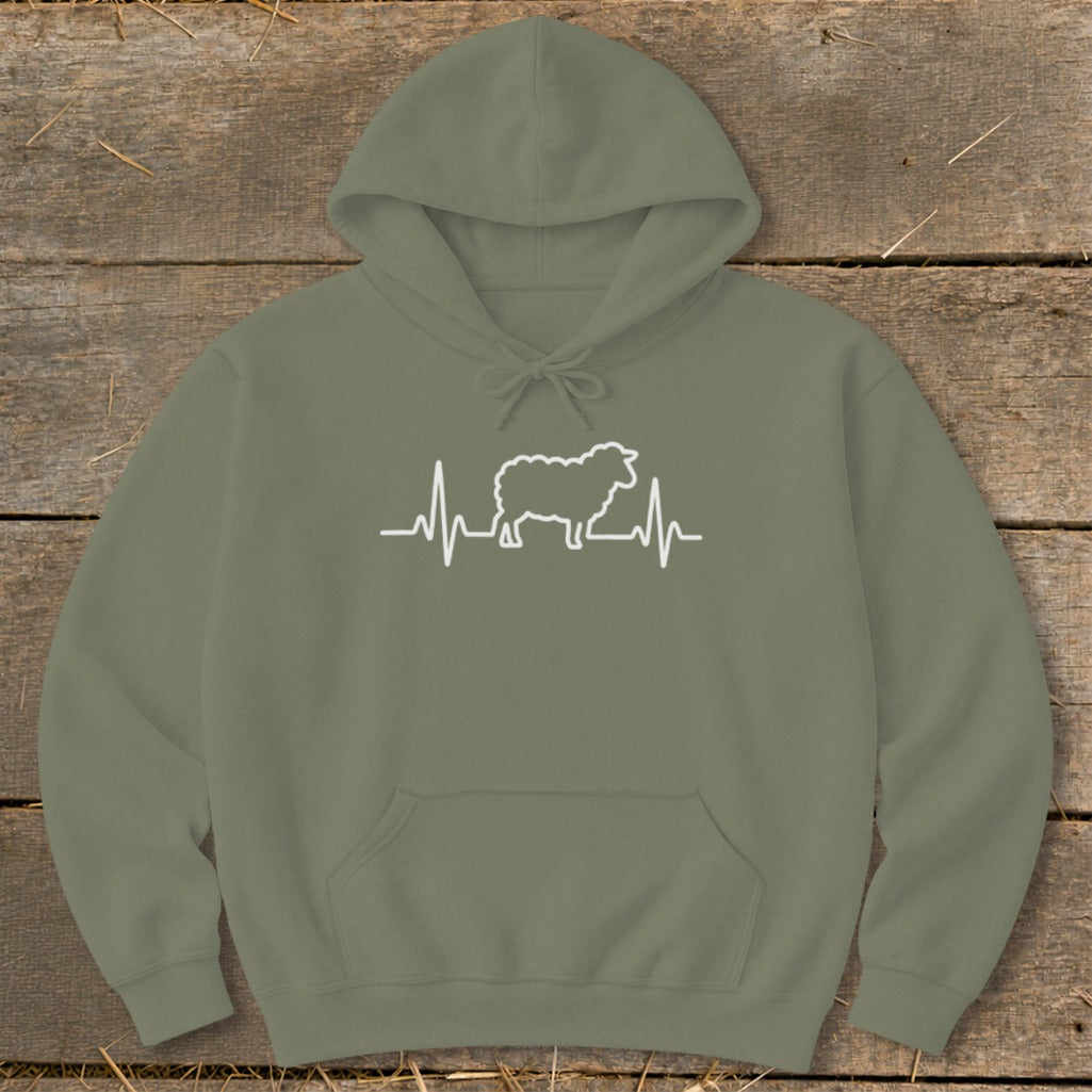 An olive green hooded sweatshirt with a white graphic of a sheep and heartbeat line.