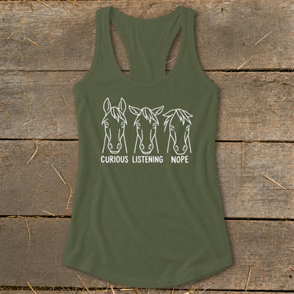 An olive green racerback tank top featuring white line art of three horses labeled Curious, Listening, and Nope.
