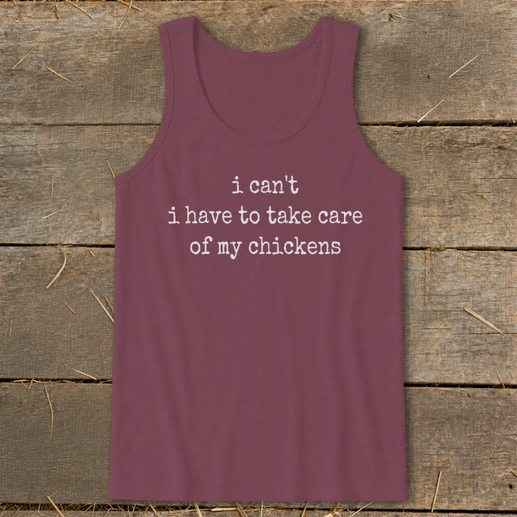 Burgundy tank top with white text "i can't i have to take care of my chickens".