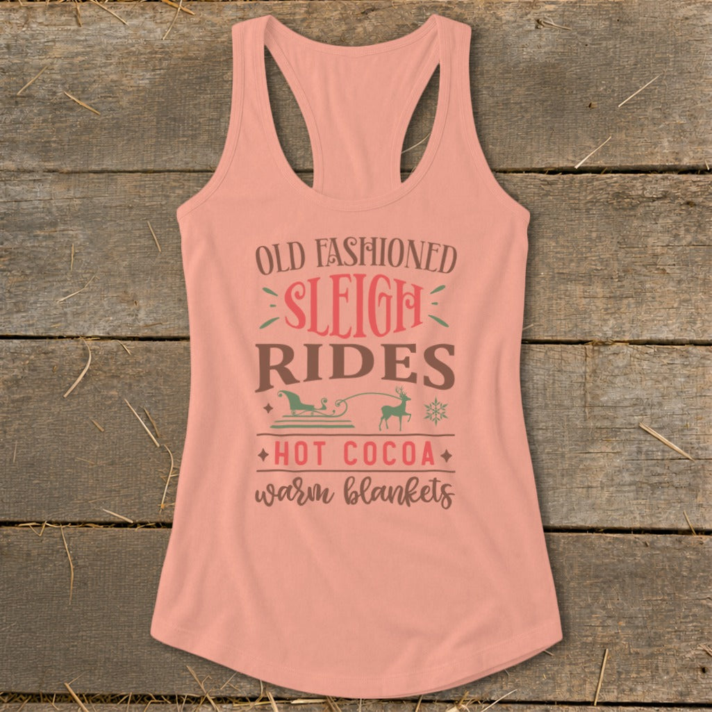 Peach tank top with "Old Fashioned Sleigh Rides, Hot Cocoa, Warm Blankets" text and graphics.