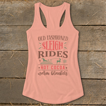 Peach tank top with "Old Fashioned Sleigh Rides, Hot Cocoa, Warm Blankets" text and graphics.