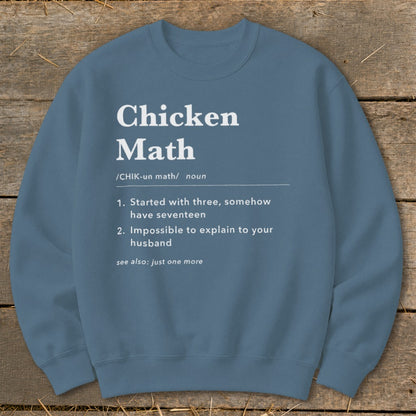 Crewneck sweatshirt with "Chicken Math" definition and humorous chicken math explanation.
