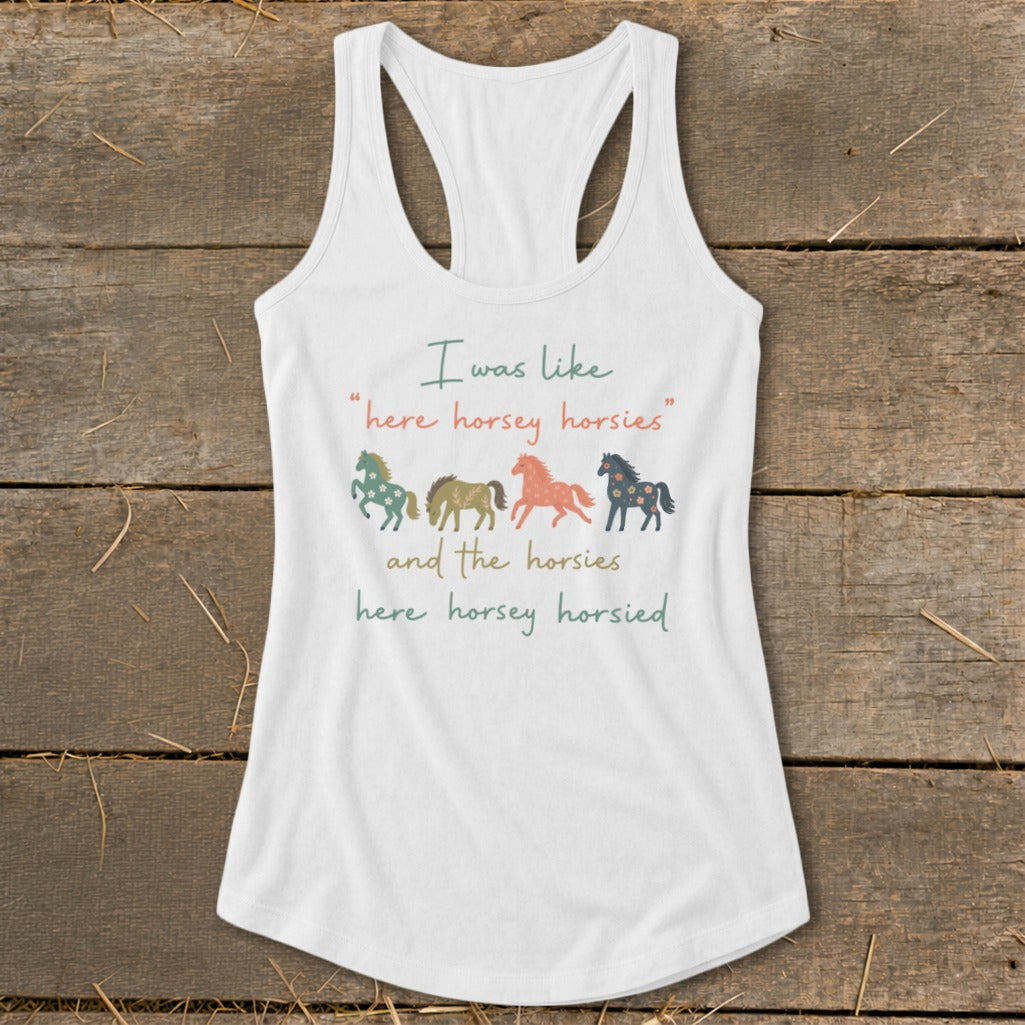 White tank top with "I was like 'here horsey horsies' and the horsies here horsey horsied" and horse graphics.