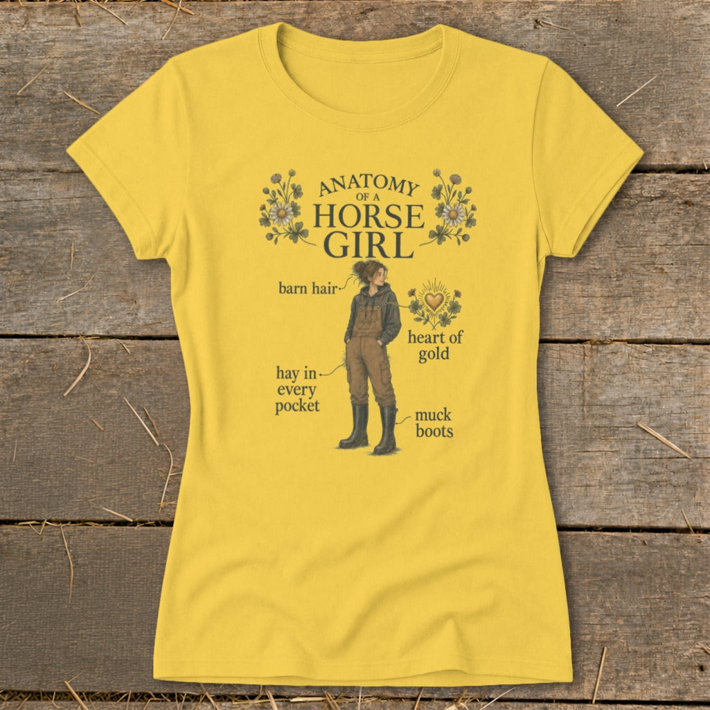 Yellow t-shirt with "Anatomy of a Horse Girl" graphic detailing barn hair, muck boots, and heart of gold.