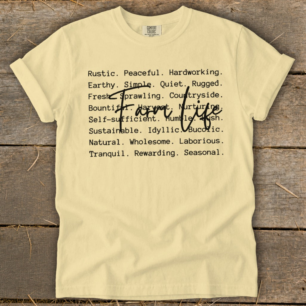 Light yellow t-shirt with "Farm life" and descriptive words in black text.
